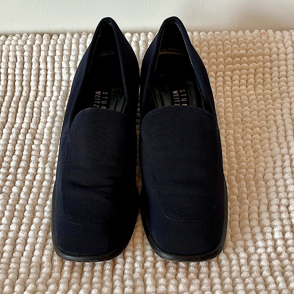 Stuart Weizmann blue slip on loafers.